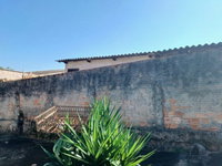 Lote de terras com 292,26 m² e 55,87 m² construídos