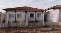 Casa geminada com 85m² cada, 252m² de terreno, ocupada