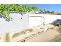 Casa ocupada com 121,71 m² de área construída