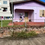 Casa de madeira com lote urbano, aceita lance parcelado