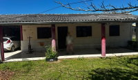 Fração de imóvel com 93,75m² em terreno de 375m², casa de 70m², 5 quadras do mar