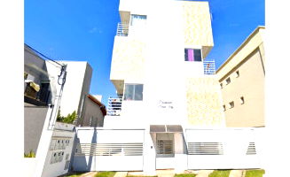 Prédio com 6 apartamentos e terreno em Poços de Caldas