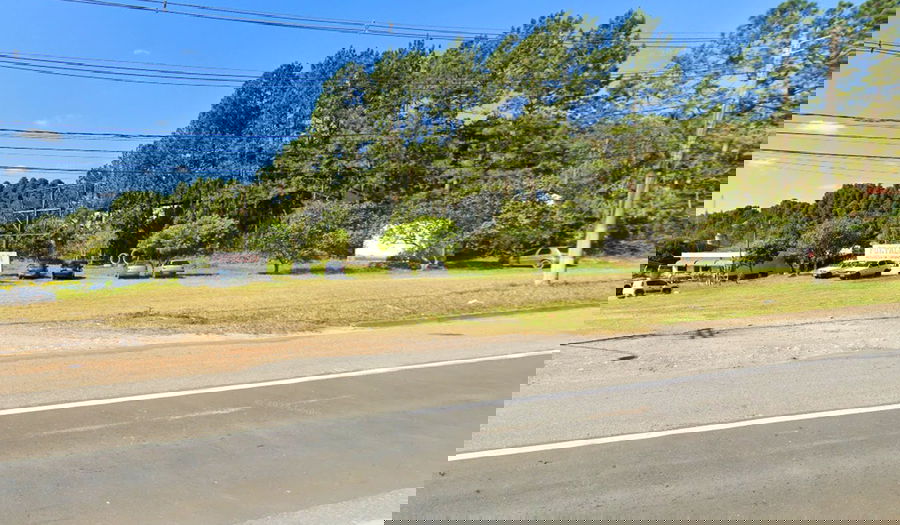 Terreno amplo com 550 vagas, área total 32.388m², desocupado
