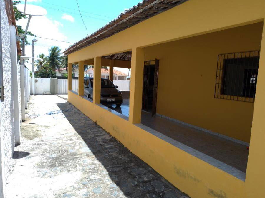 Casa ocupada com 100m² construída e terreno de 427m²