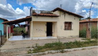 Casa residencial com 1 quarto e 1 banheiro, área construída de 61.87m², ocupada.