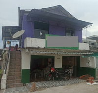 Casa Ocupada no Centro com 2 Quartos e 2 Banheiros