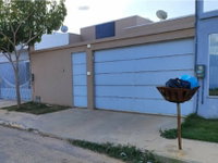 Casa com 2 quartos, 1 suíte, 1 vaga de garagem, 200m² de terreno, ocupada
