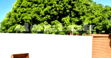 Terreno com construção simples nos fundos em Campo Grande/MS