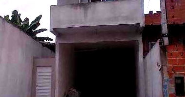 Prédio padrão com 3 quartos, 2 banheiros e 1 vaga de garagem, ocupado