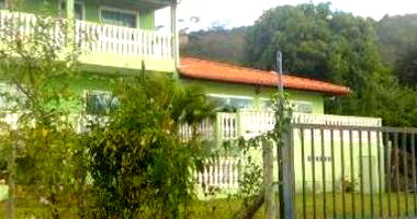 Casa com 3 quartos, 2 banheiros, 259m² construída, ocupada