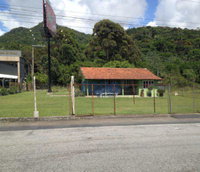 Terreno com Casa em Itapema - Oportunidade Única!