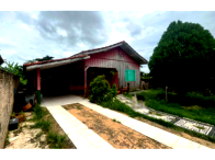 Casa de madeira com amplo terreno em Nova Monte Verde