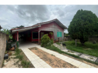 Casa de madeira com amplo terreno em Nova Monte Verde