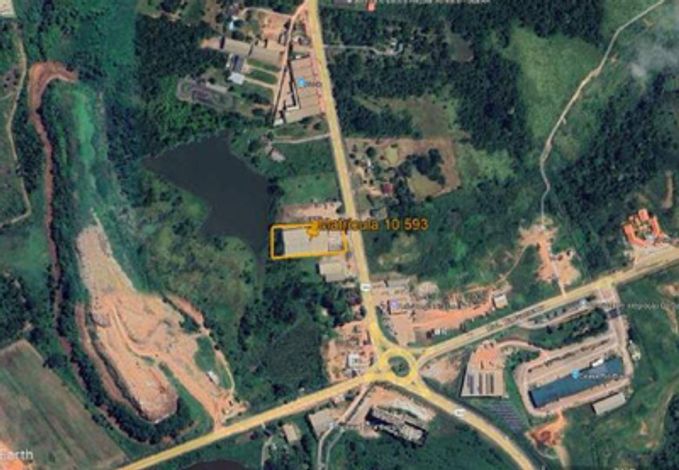 Terreno com galpão, terraplanagem e pavimentação, 6.910m² terreno e 5.185m² construídos
