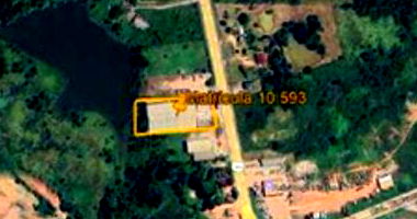 Terreno com galpão, terraplanagem e pavimentação, 6.910m² terreno e 5.185m² construídos, ocupado