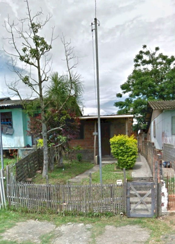 Casa de Alvenaria com Terreno Amplo em Alvorada/RS