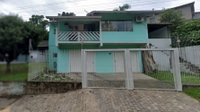 Casa ocupada com 168,90 m² em terreno de 446,35 m²