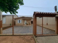 Casa com 60m² e prédio com 158m² em terreno de 330m²