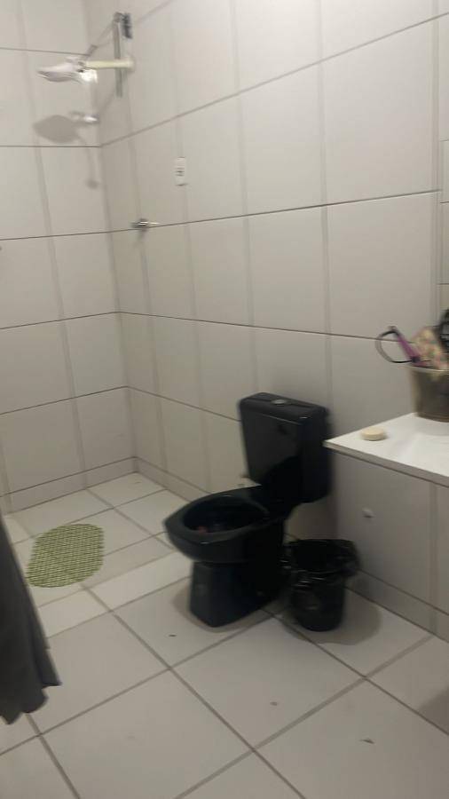 Casa com 3 quartos, 2 banheiros e 174m² construída, ocupada