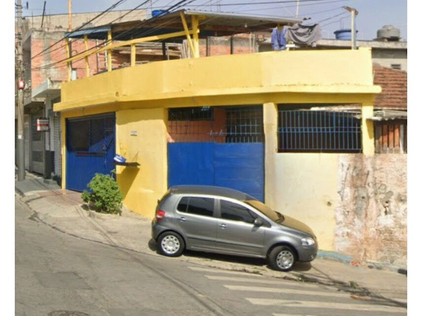 Casa parte ideal 50% com terreno de 294m², imóvel ocupado