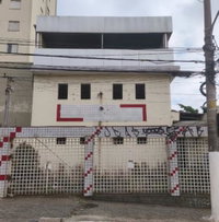 Casa com 3 andares e 564m² de área construída, ocupada