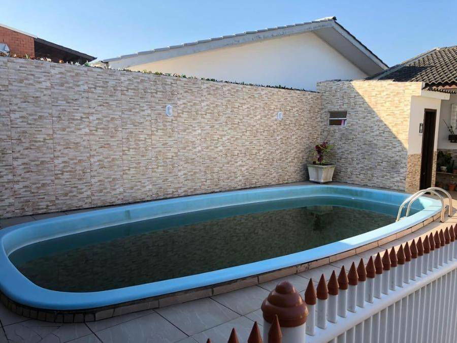 Casa com 3 quartos, 2 banheiros e 126m² construída, ocupada