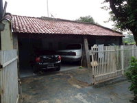 Casa padrão com 2 quartos, 2 banheiros e 1 vaga - Ocupada