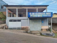 Casa Ocupada com 120m² de Área Construída