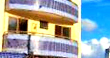 Apartamento padrão com 2 quartos, 2 banheiros e 1 vaga, ocupado