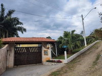 Casa em condomínio com 5 quartos e 5 banheiros, 400,43m², ocupada