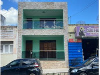 Casa ocupada com 2 pavimentos e 309,60 m² construídos