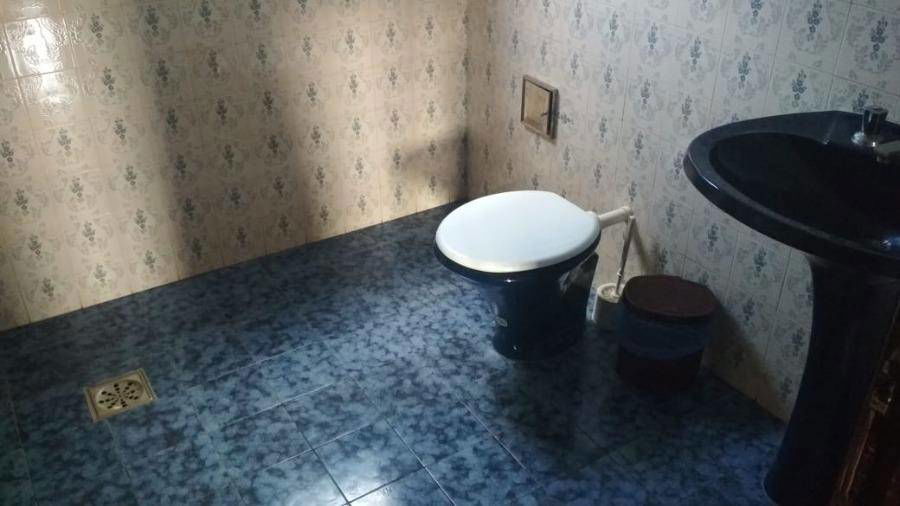 Casa com 3 quartos, 2 banheiros e 251m² construída, ocupada