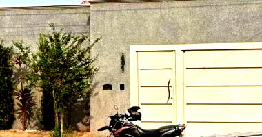 Casa espaçosa com 4 quartos, 3 banheiros e 216 m² construída, ocupada