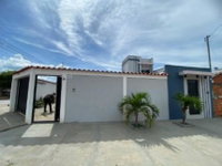 Casa com 2 pavimentos, 177,04m² construídos, ocupada