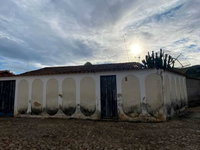Casa com 3 quartos, 2 banheiros e 176m² de área construída, ocupada