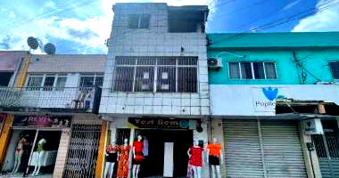 Prédio comercial ocupado com 54m² área construída