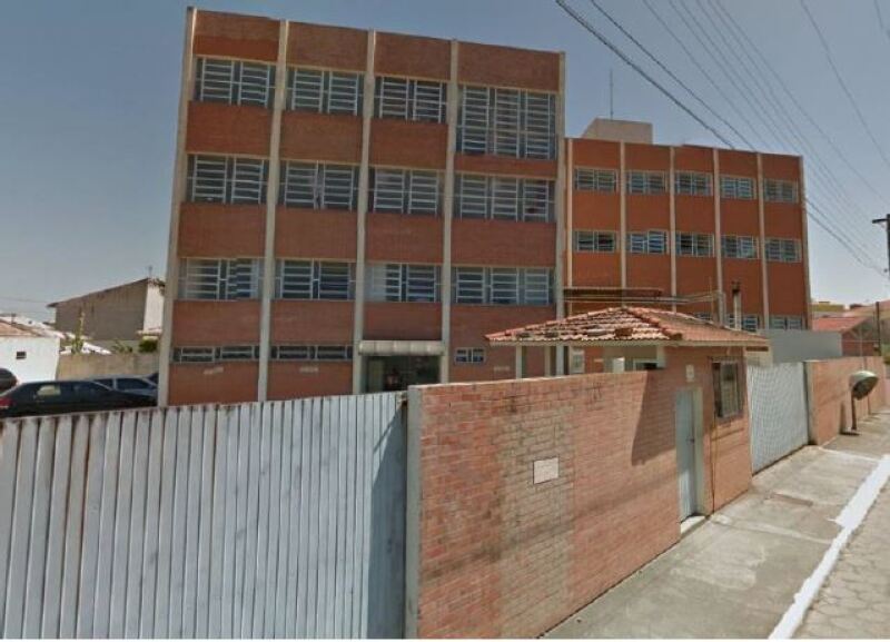 Terreno urbano com benfeitorias, 4 pavimentos, ocupado