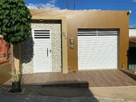 Casa padrão com 3 quartos e 1 vaga, área construída de 105,75m²