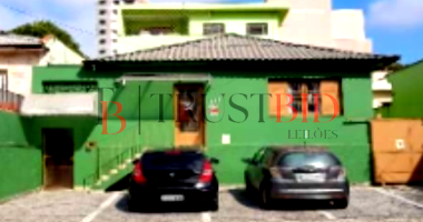 Casa com 415m² de terreno, ocupada, em Vila Valparaíso