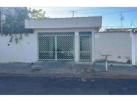 Casa ocupada com 3 quartos e 106 m² construídos