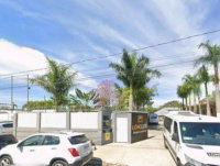 Prédio comercial de alvenaria próximo à BR-116