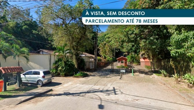 Casa com 706 m² de área construída, ocupada, em condomínio