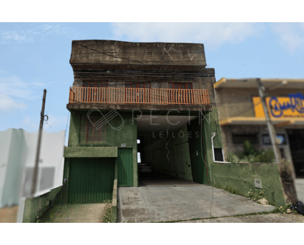 Galpão Comercial Amplo com 932m² de Área Construída