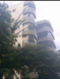 Apartamento espaçoso com 3 vagas de garagem no Edifício Ligia