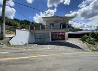 Terreno com casa e sala comercial, 688,89m²