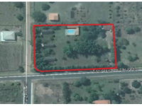 Chácara ocupada com 350m² construídos em terreno amplo