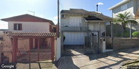 Terreno com casa de alvenaria 2 pisos, não averbada