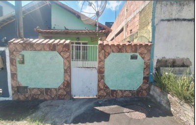 Casa ocupada com 43,75 m² de área construída