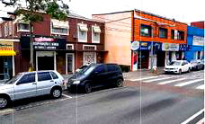 Prédio misto com 3 lojas e 2 apartamentos em Curitiba