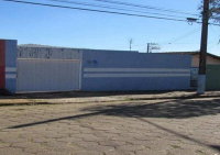 Casa Ampla com 3 Quartos e 3 Vagas no Centro